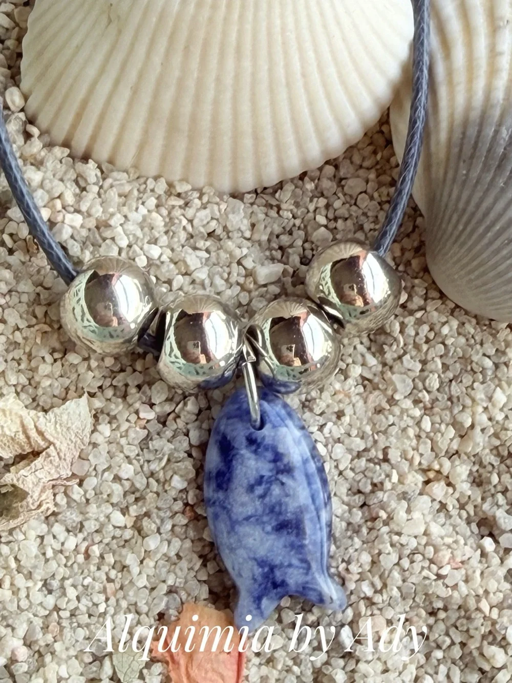 Carved fish sodalite gemstone charm necklace gray blue cord